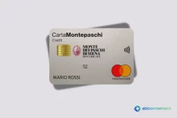 Carta Montepaschi Classic color avorio con decorazioni a onde, logo Monte dei Paschi di Siena e simbolo Mastercard in evidenza.