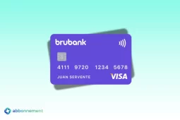 Tarjeta brubank violeta con chip, ícono contactless y logo Visa en primer plano.