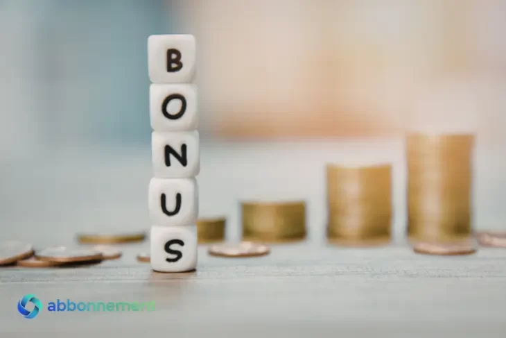 Bonus sociale bollette, blocchi con la scritta “BONUS” in primo piano e monete sfocate sullo sfondo, simbolo di agevolazioni sulle bollette.